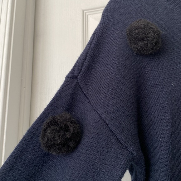Adorable sweater. Navy with black fuzzy balls. Made by CeCe size small. - Picture 5 of 7